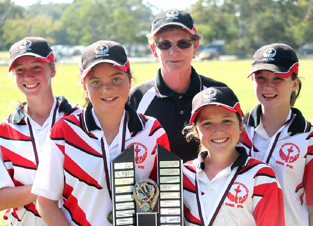 Gympie players Ursula Whitfield, Zo-Emma Brooke, Hanna Wilson and Jamie Mills with manager Stella Macklin and the state championship trophy. Gympie players Ursula Whitfield, Zo-Emma Brooke, Hanna Wilson and Jamie Mills with manager Stella Macklin and the state championship trophy.